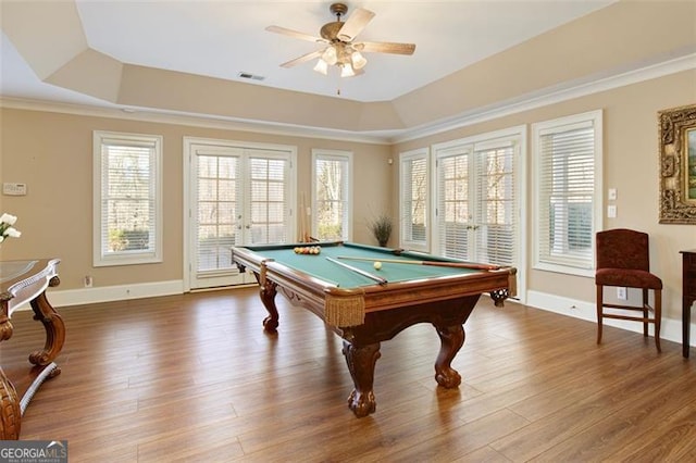 playroom featuring ceiling fan, plenty of natural light, a tray ceiling, and billiards