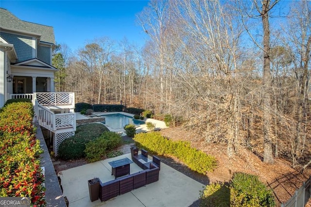 view of yard featuring a patio area and an outdoor hangout area