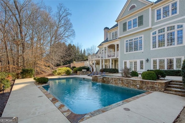 view of pool with a patio area