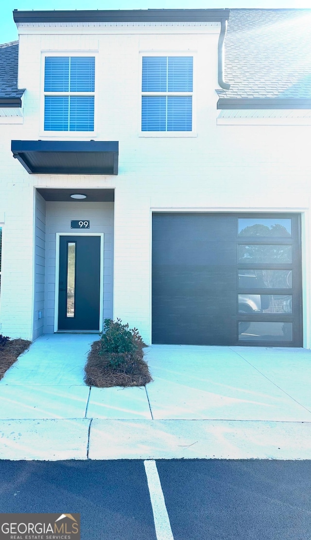 exterior space with a garage