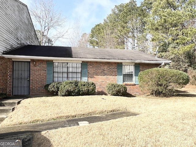 view of property exterior featuring a yard