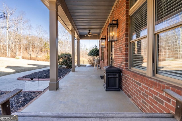 view of patio featuring ceiling fan and covered porch