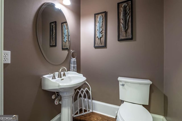 bathroom featuring toilet