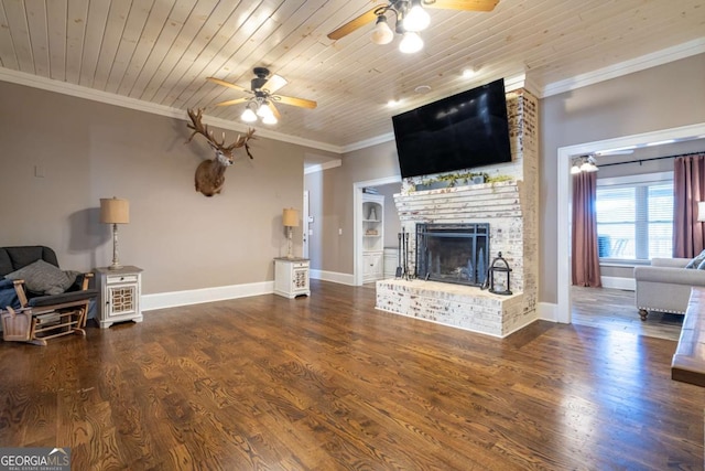 living room featuring wooden ceiling, a brick fireplace, ceiling fan, dark hardwood / wood-style flooring, and ornamental molding