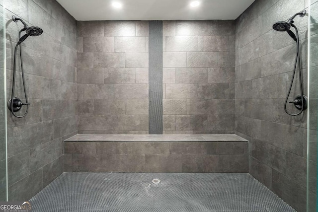 bathroom featuring a tile shower