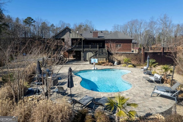 view of pool with a patio