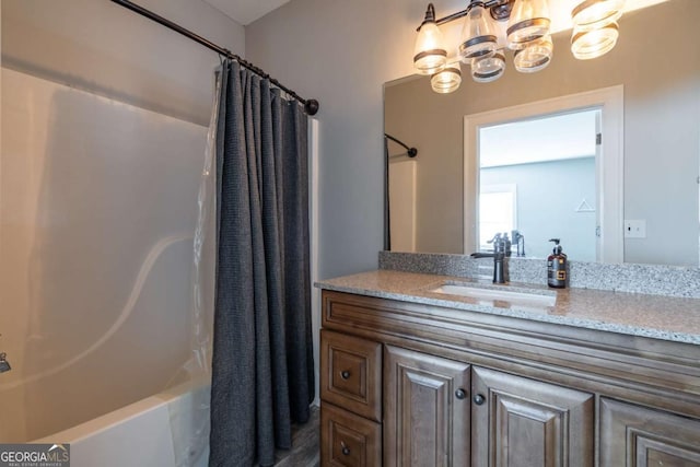 bathroom with vanity and shower / bath combo with shower curtain