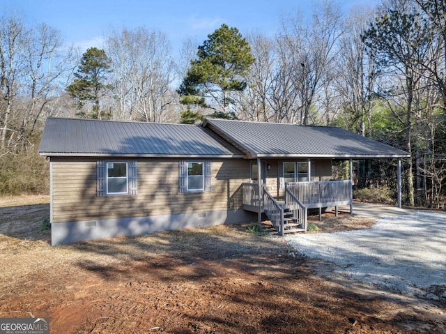 ranch-style house with covered porch