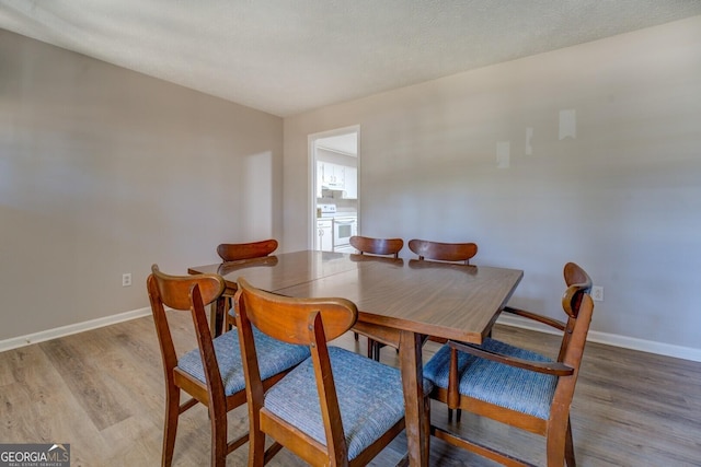 dining area featuring light hardwood / wood-style floors