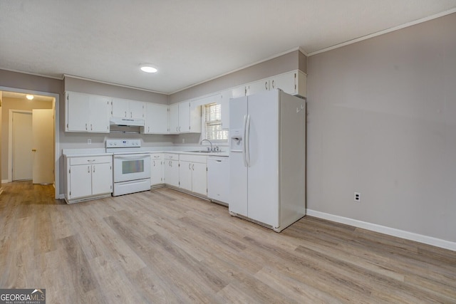 kitchen with white appliances, white cabinetry, and light hardwood / wood-style floors