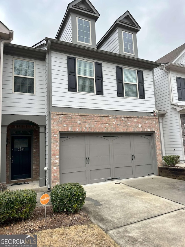 view of front of home featuring a garage