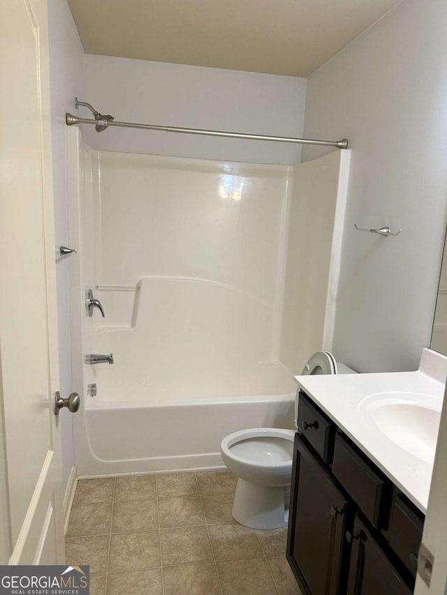 full bathroom with toilet, vanity, and bathtub / shower combination