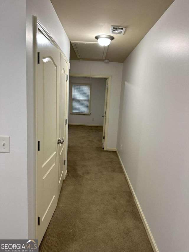 corridor with carpet floors