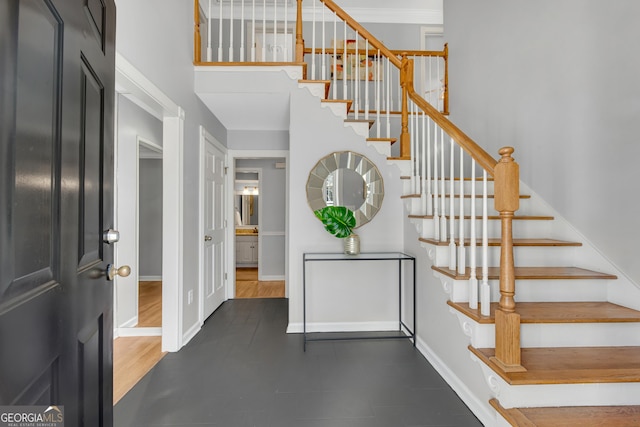 entryway with a high ceiling