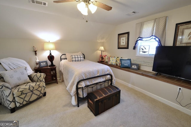 bedroom featuring vaulted ceiling, ceiling fan, and light colored carpet