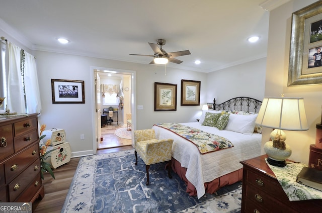 bedroom with ensuite bathroom, ceiling fan, ornamental molding, and wood-type flooring