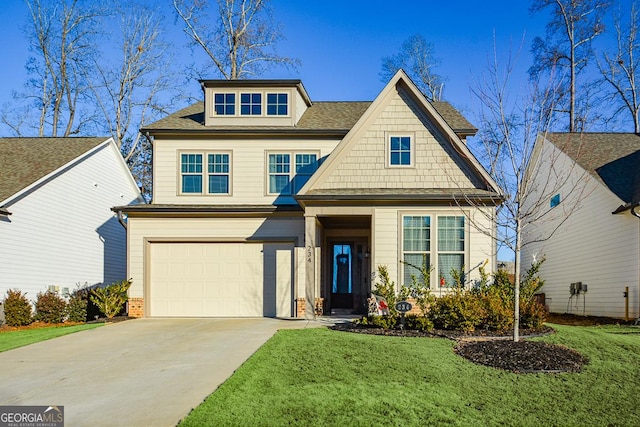 craftsman-style house featuring a garage and a front lawn