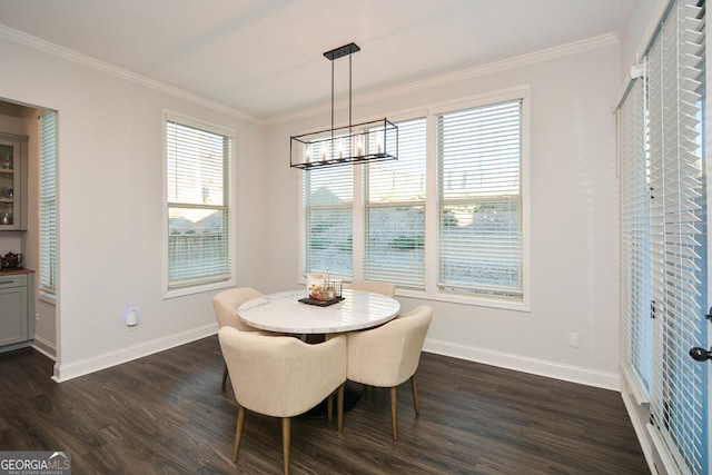 dining space featuring a chandelier, a wealth of natural light, ornamental molding, and dark hardwood / wood-style floors