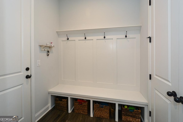 mudroom featuring dark wood-type flooring