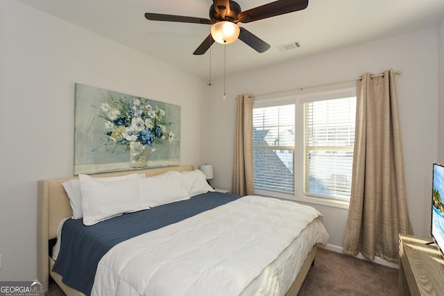 carpeted bedroom featuring ceiling fan