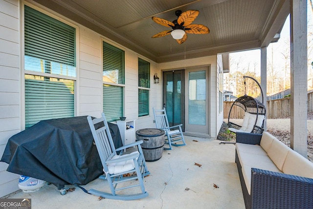 view of patio featuring ceiling fan, grilling area, and an outdoor hangout area