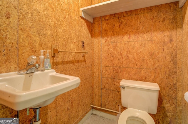 bathroom with sink and toilet