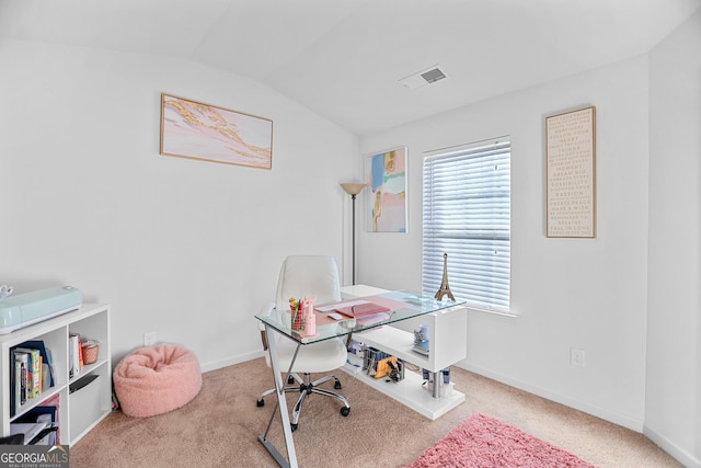 office space with carpet and lofted ceiling