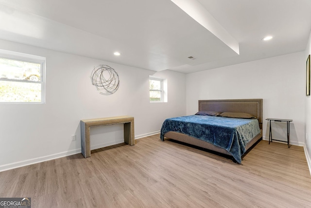 bedroom with light wood-type flooring