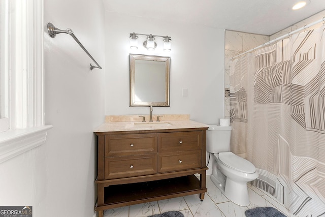 bathroom with curtained shower, toilet, and vanity