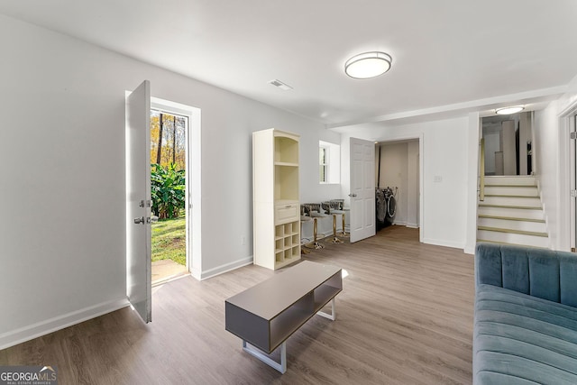 living room with wood-type flooring