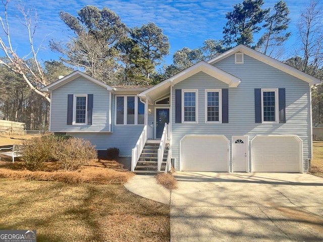 split foyer home featuring a garage