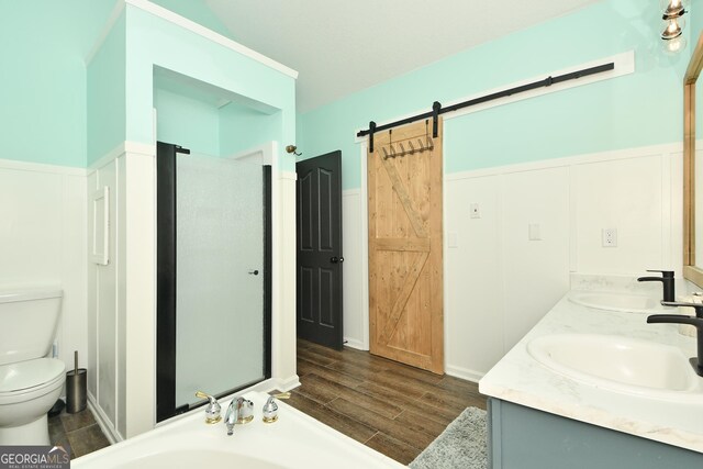 full bathroom with toilet, vanity, plus walk in shower, and hardwood / wood-style floors