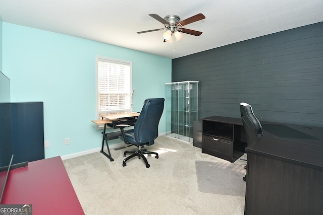 office area with light carpet and ceiling fan