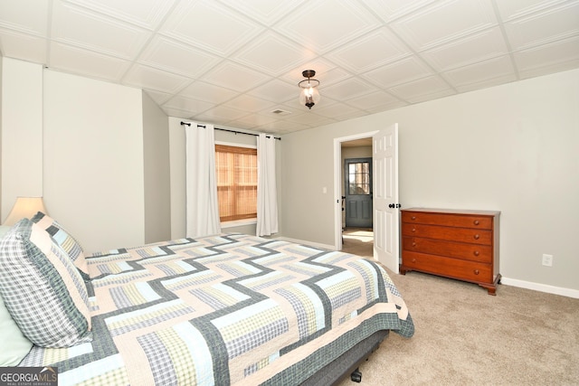 bedroom featuring light carpet