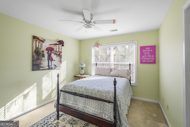 bedroom featuring ceiling fan and carpet floors