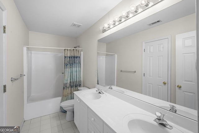 full bathroom featuring tile patterned flooring, vanity, shower / bath combination with curtain, and toilet