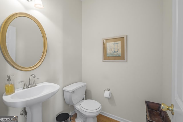 bathroom with sink and toilet