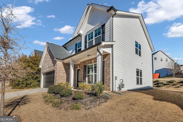 view of side of property featuring a garage