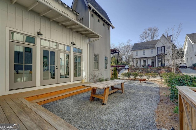 view of patio featuring french doors and a residential view