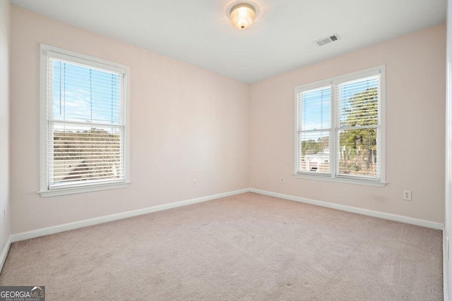 view of carpeted spare room