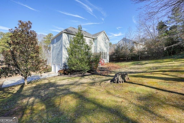 view of property exterior featuring a lawn