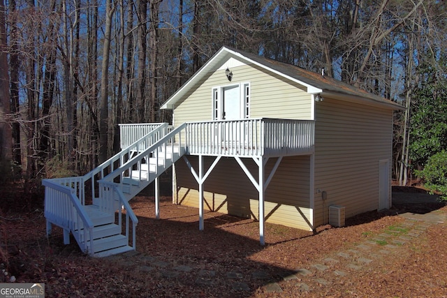 view of front of house featuring a wooden deck