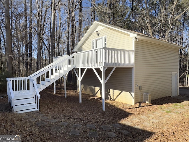 view of side of property with a deck