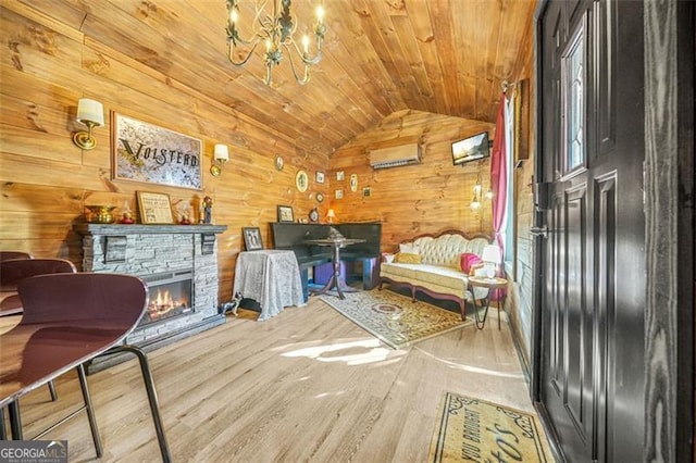 unfurnished room with lofted ceiling, wood-type flooring, a stone fireplace, wooden ceiling, and a chandelier