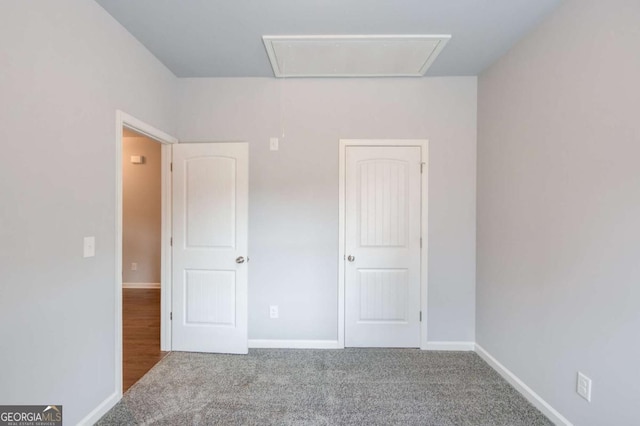 unfurnished bedroom featuring carpet