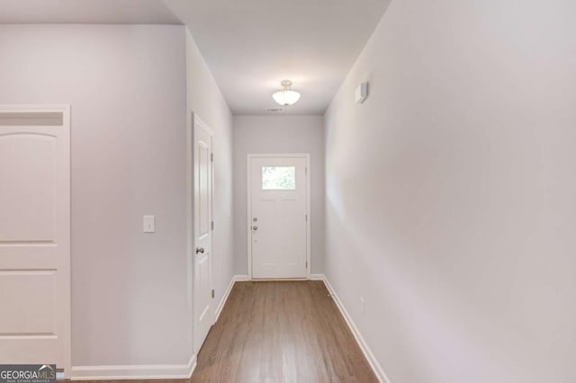 doorway featuring hardwood / wood-style flooring