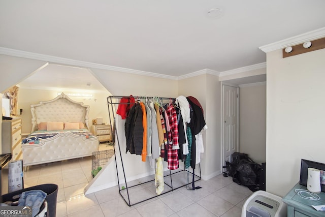 bedroom with light tile patterned floors and ornamental molding