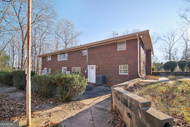 view of home's exterior featuring central AC unit