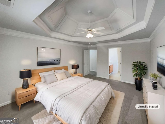 bedroom with ceiling fan, coffered ceiling, crown molding, and connected bathroom