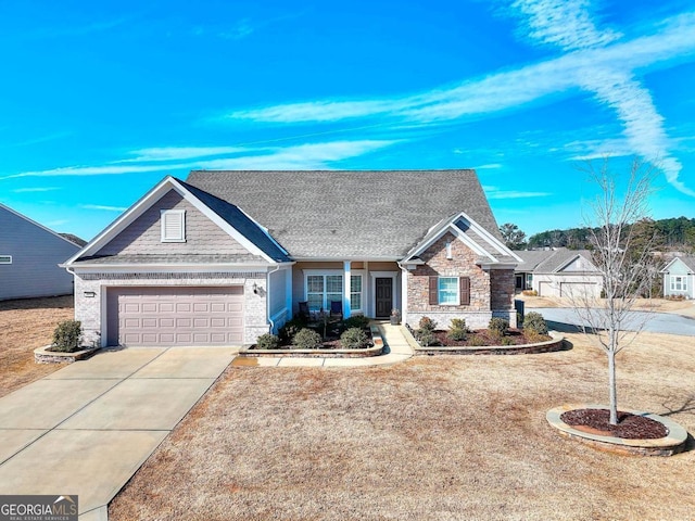 single story home featuring a garage